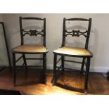 A pair of 19th Century green painted rattan seated bedroom chairs (2)