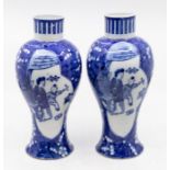 A pair of 19th century Chinese blue and white inverted baluster vases, prunus blossom decoration,