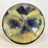 The Mitchell Collection of Moorcroft Pottery: A Moorcroft 'Pansy' pattern disc brooch with an