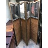 An Edwardian gilt framed four panel bedroom dressing screen, glazed upper sections with silk