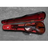 A cased violin and bow, the case with label 'Jerome Thibouville-Lamy Co Paris'