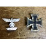 A reproduction Iron Cross and 1939 Bar.