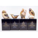 Four Royal Crown Derby paperweights including tawny owl, kingfisher, squirrel and garden bird,