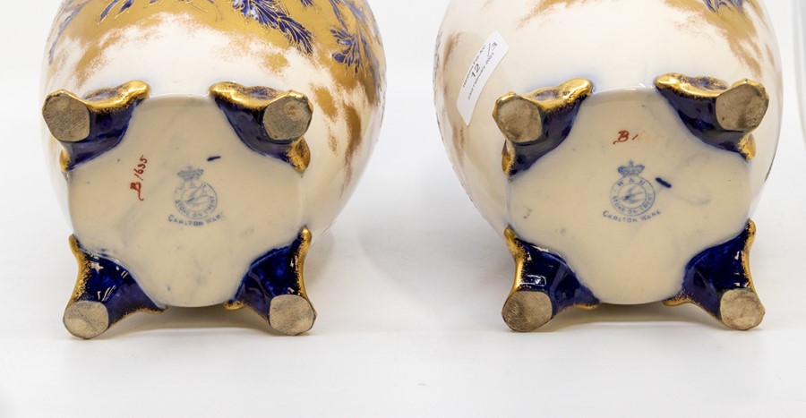 A pair of Carlton Ware ovoid vases, blue flowers with gilding, raised on four feet; and a Royal - Image 2 of 4