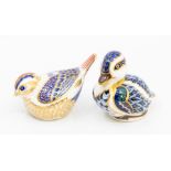 Two Royal Crown Derby silver stopper paperweights, a duck and a garden bird