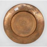 An early 20th Century brass Islamic arms salver, with Islamic wording and decoration