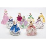 A collection of nine small Coalport lady figures