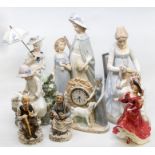 Two Nao figures; two Spanish figures including a clock; Royal Doulton lady; Continental lady, and