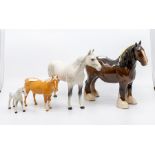 Four John Beswick horses, palomino and one is AF