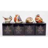 Four Royal Crown Derby paperweights, gold stopper, in box, to include a hedgehog, crested tit, robin