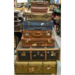 A collection of eight travel trunks and travel cases, leather, wood and vinyl examples