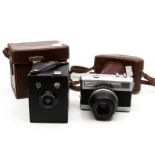 Two mid 20th Century cased vintage cameras, Brownie etc