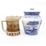 Modern Spode blue and white biscuit barrel along with Castle Beers water jug