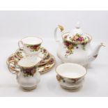 A Royal Albert Old Country Roses tea set for six, including cups and saucers, teapot, milk and