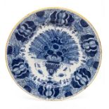 A collection of three chargers to include: Delft style blue and white decorated with central