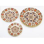 Four Royal Crown Derby 1128 pattern large plates, first quality with matching medium and two small