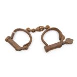 A pair of late 19th Century police handcuffs