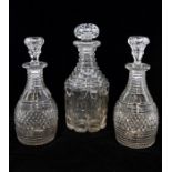 A pair of small 19th century cut-glass decanters; a large 19th century cut glass decanter (3)
