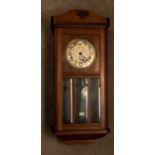 1940's oak cased wall clock, Arabic numerals on round face