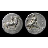 Ancient Greek, Calabria Tarentum.  Circa, 342-231 B.C. Silver, 8.0 grams. Obverse: Naked youth on