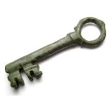 Medieval Door Key.   Circa 13th - 14th century AD. Size: 90.74 mm. A large bronze key with a