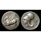 Ancient Greek, Corinth Stater,  Circa, 338 B.C. Silver, 8.5 grams. Obverse: Pegasus with pointed