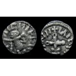 Series F Prototype Sceattas.  Circa, AD 670. Silver, 1.05 grams. 11.51 mm. Obverse: Heavy-jowled