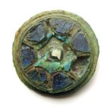 Anglo-Scandinavian Cloisonne Brooch.    Circa 10th century AD. Size: 22.91 mm. A copper-alloy disc