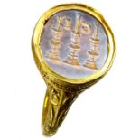 The Lowe Family 17th Century Gold Signet Ring.  Circa, 1600-1650 AD. Gold, 17.8 grams. 29 mm. A very