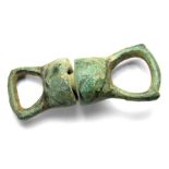 Medieval Bronze Leash Swivel.   Circa 15th - 16th century. Size: 47.01 mm. A leash swivel formed