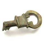 Roman Bronze Key.    Circa 2nd century AD. Size: 33.95 mm. A cast bronze key consisting of a