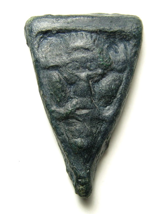 Anglo-Saxon Pressblech Die.   Circa 8th - 9th century. Size: 32.36 mm. A cast bronze triangular