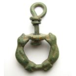 Medieval Zoomorphic Swivel.   Circa, 12th - 13th century AD. Size: 47.30 mm. A romanesque style