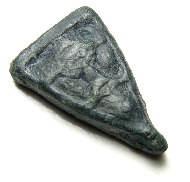 Anglo-Saxon Pressblech Die.   Circa 8th - 9th century. Size: 32.36 mm. A cast bronze triangular - Image 2 of 3