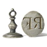 Silver Seal Matrix.   Circa 18th century AD. Silver, 9.16 grams. Size: 25.08 mm. A fob type seal