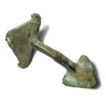 Anglo-Saxon Brooch.  Copper-alloy, 8.58 grams. 56.16 mm. Circa 5th century AD. A bow brooch with