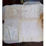 A white cotton lawn handkerchief with a crochet hem and corners, early 1950's, with the initial E,