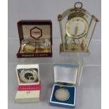 An Ingersoll Triumph pocket watch, with original guarantee, in box, together with a Timex