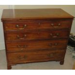 An early Victorian mahogany four-drawer chest of drawers on bracket feet with brass handles. 93 cm