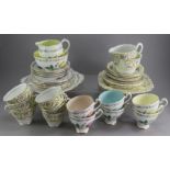 An Intermegge Roslyn china tea set6: 6 cups and 4 saucers, 6 tea plates, 1 sandwich plate, milk jug,