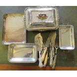 A large group of plated wares to include knives, serving dishes, nut crackers, etc.