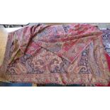 A large paisley pashmina, red ground