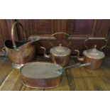 Two nineteenth century large copper kettles, a coal scuttle and a lidded cooking vessel. (4)