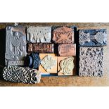 Collection of four newspaper type printing blocks (three copper, one steel), depicting Winchester