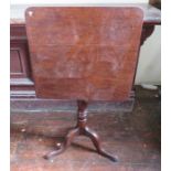 A Victorian square tilt-top mahogany table. 56 cm wide.