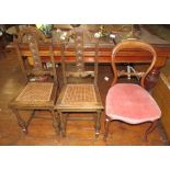 A group of three chairs to include a Victorian mahogany dining chair and two oak dining chairs. (3)