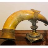 A Victorian presentation of a pewter mounted Long horn, raised on a brass and pewter stand (a/f)
