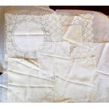 A delicately designed doily, 1920/30's together with a very fine cotton lawn handkerchief, centre is