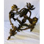 A late 19th Century gilt cherub hanging lighting.