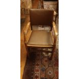 A circa 1930's oak office desk armchair, with studded rexine cover, together with a 19th Century